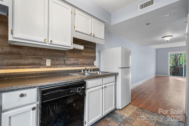 kitchen featuring white cabinets, dishwasher, white fridge, and sink