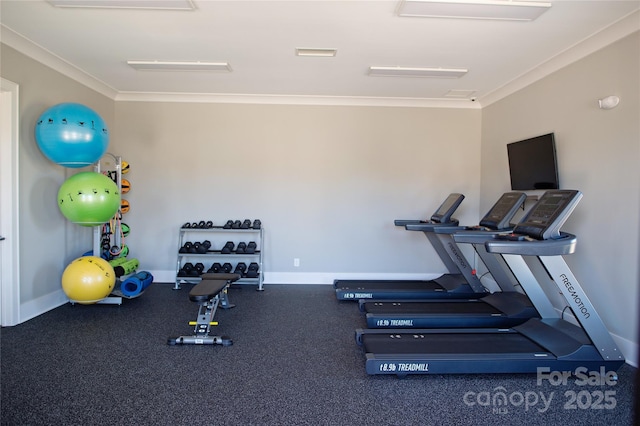 workout area with crown molding