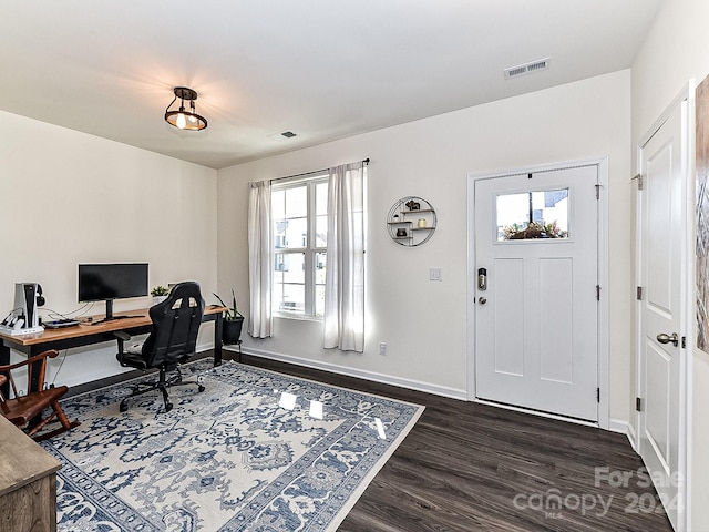 office featuring dark hardwood / wood-style flooring and plenty of natural light