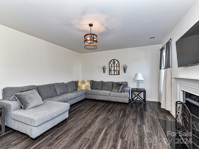 living room featuring dark hardwood / wood-style floors