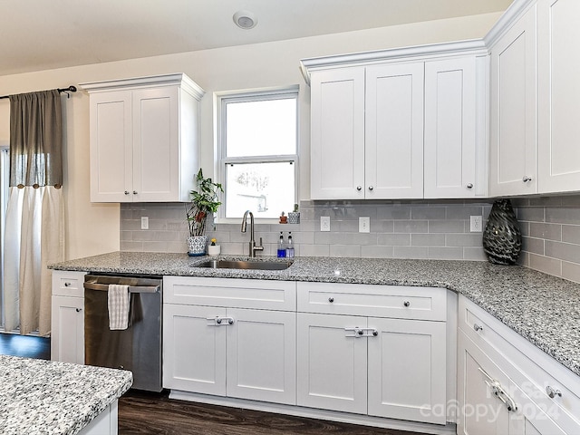 kitchen featuring white cabinetry, dishwasher, dark hardwood / wood-style floors, and sink