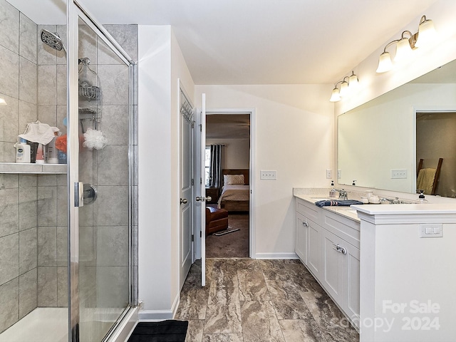 bathroom with vanity and walk in shower