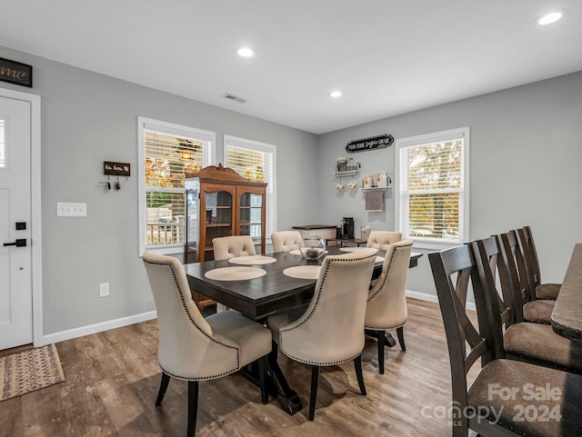 dining area featuring hardwood / wood-style floors