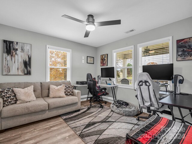 office space featuring ceiling fan and wood-type flooring