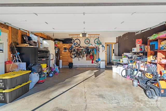 garage featuring a garage door opener