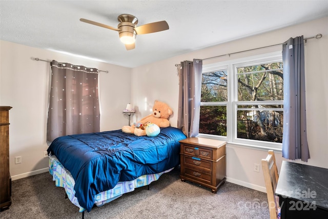 carpeted bedroom with ceiling fan