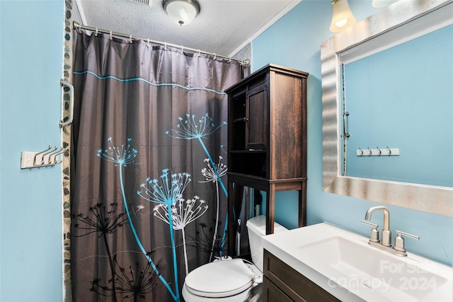 bathroom with vanity, a shower with curtain, a textured ceiling, and toilet