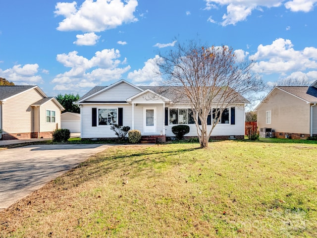 single story home featuring a front yard