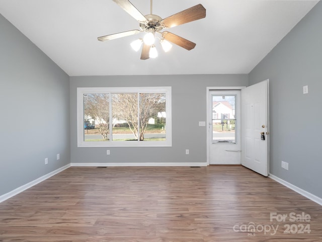 interior space featuring hardwood / wood-style flooring, ceiling fan, and a wealth of natural light