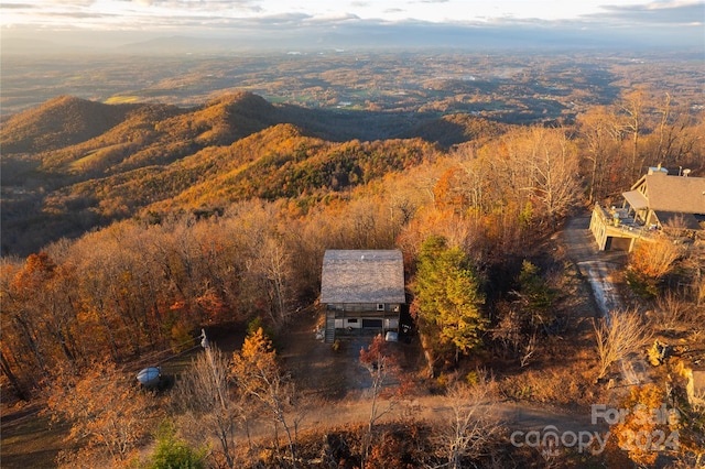 birds eye view of property featuring a mountain view