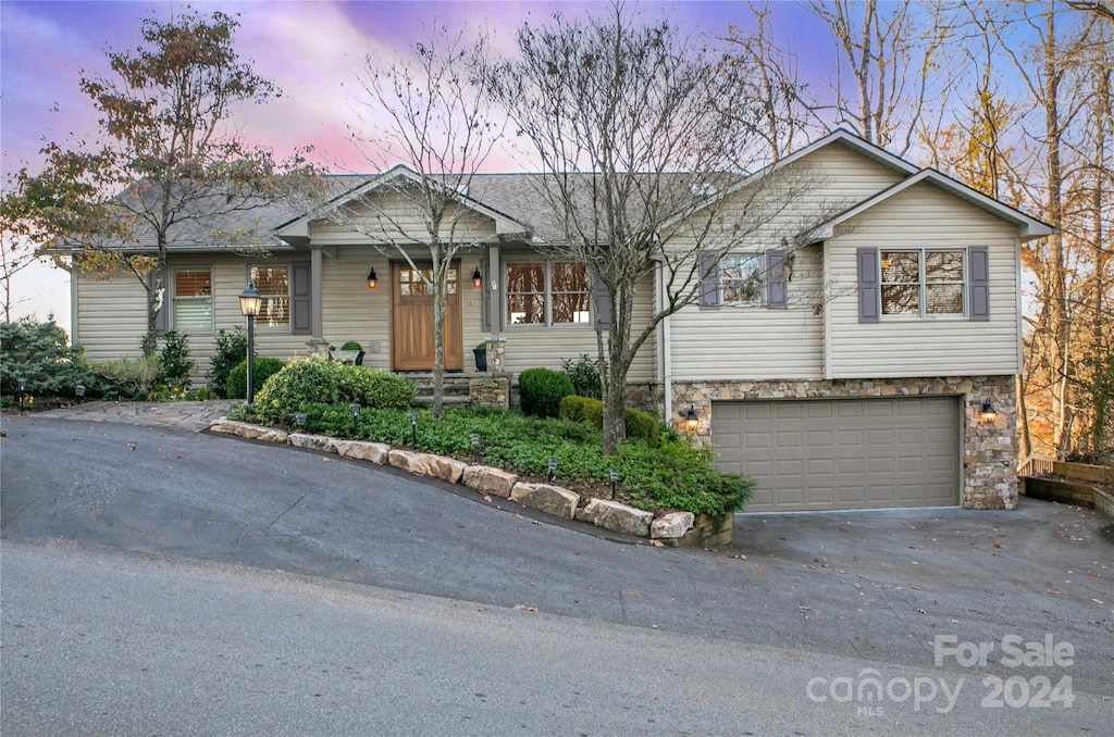 view of front of home with a garage