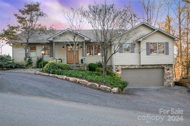 view of front of home with a garage