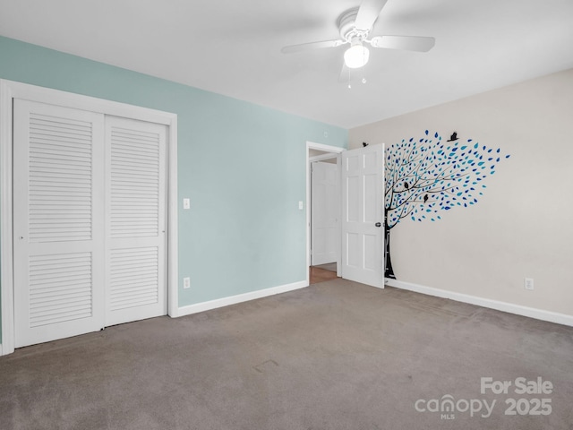 unfurnished bedroom featuring carpet, a closet, ceiling fan, and baseboards