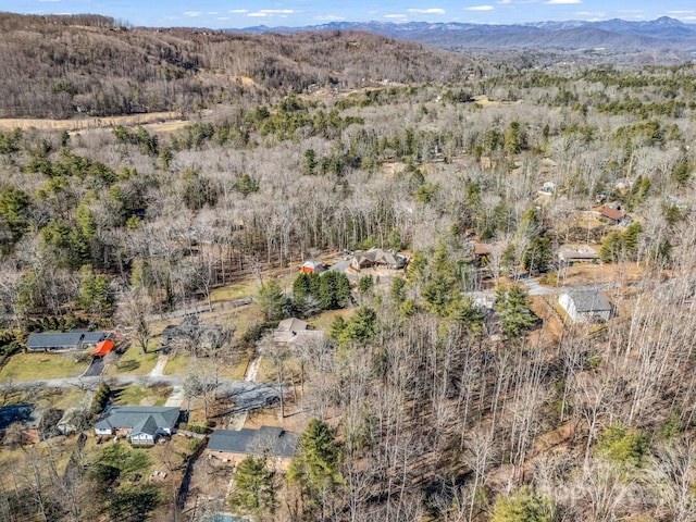 aerial view featuring a mountain view and a forest view