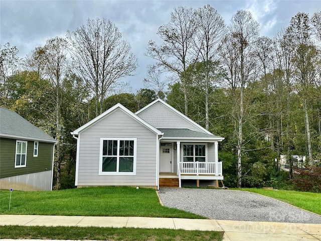 view of front of house featuring a front lawn and a porch