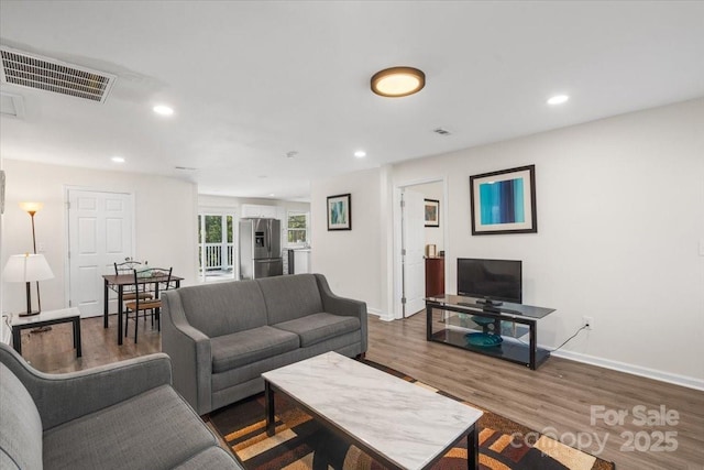 living room featuring hardwood / wood-style flooring