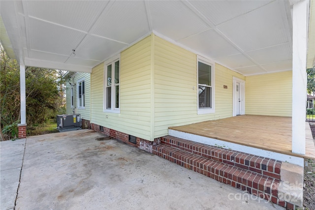 exterior space featuring covered porch and central air condition unit