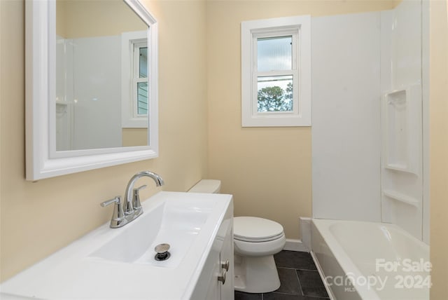 bathroom with tile patterned floors, vanity, and toilet