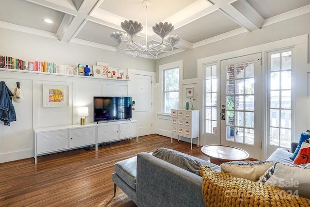 living room with dark hardwood / wood-style floors, a wealth of natural light, and coffered ceiling