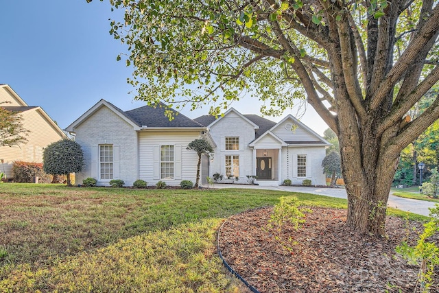 view of front of property with a front lawn