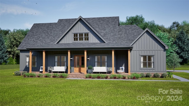 modern farmhouse style home with a porch and a front lawn