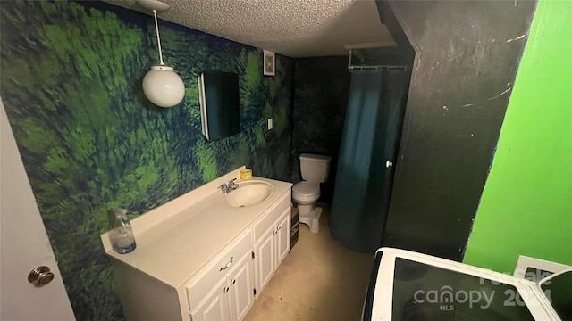 bathroom with walk in shower, concrete flooring, a textured ceiling, toilet, and vanity