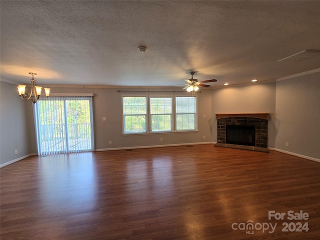 unfurnished living room with a textured ceiling, a fireplace, ceiling fan with notable chandelier, and dark hardwood / wood-style floors