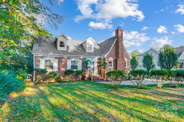 view of front of home with a front yard