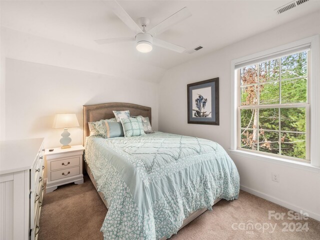 carpeted bedroom with ceiling fan