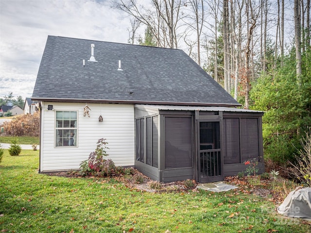 503 Rosebud Orchid Way, Weaverville, NC 28787 - rear view of house with a sunroom, a shingled roof, and a yard