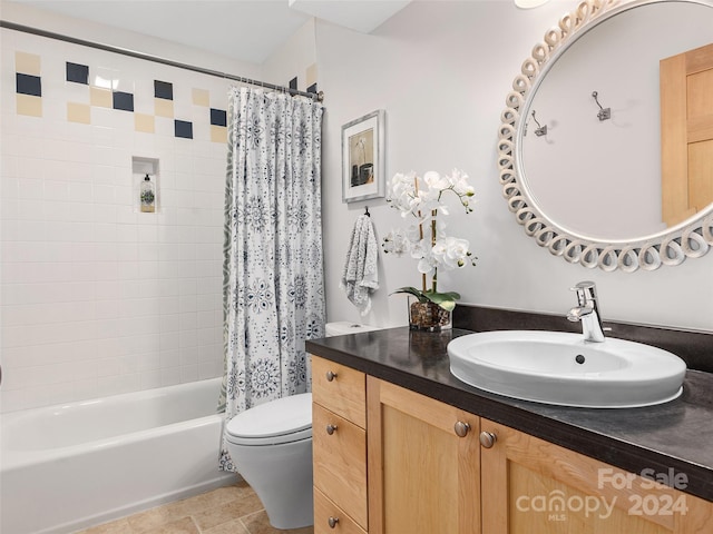 full bathroom featuring vanity, toilet, and shower / tub combo