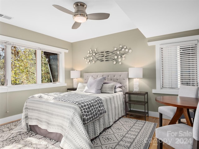 bedroom featuring ceiling fan and light hardwood / wood-style flooring