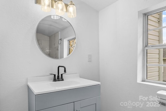 612 E E St, Newton, NC 28658 - bathroom featuring a chandelier and vanity