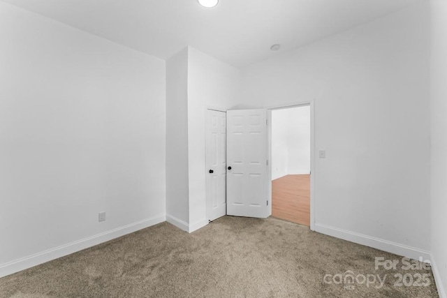 612 E E St, Newton, NC 28658 - carpeted empty room featuring baseboards