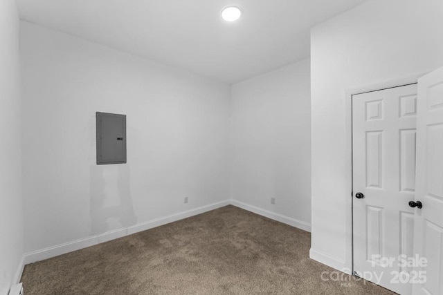 612 E E St, Newton, NC 28658 - unfurnished room featuring electric panel, carpet flooring, and baseboards