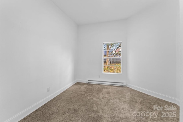 612 E E St, Newton, NC 28658 - spare room with baseboard heating, carpet flooring, baseboards, and lofted ceiling