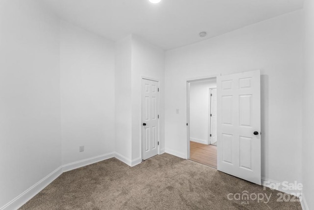 612 E E St, Newton, NC 28658 - carpeted spare room with baseboards and a smoke detector