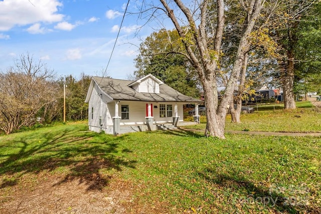 612 E E St, Newton, NC 28658 - bungalow-style house with a porch and a front lawn