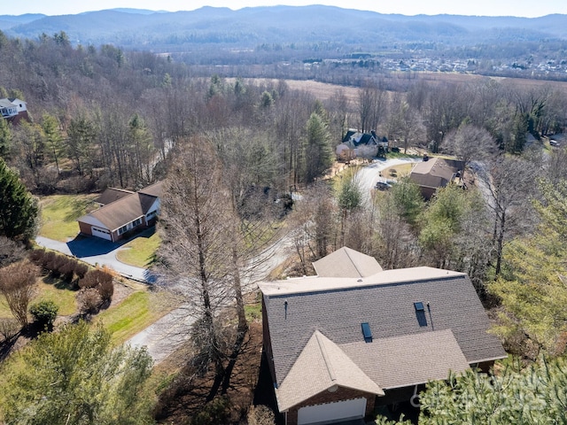 drone / aerial view featuring a mountain view