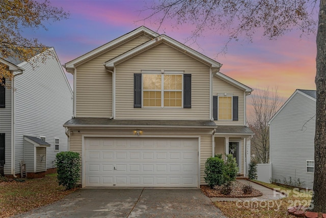 view of front property with a garage