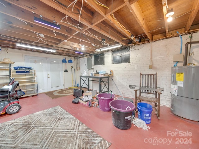 basement featuring electric water heater