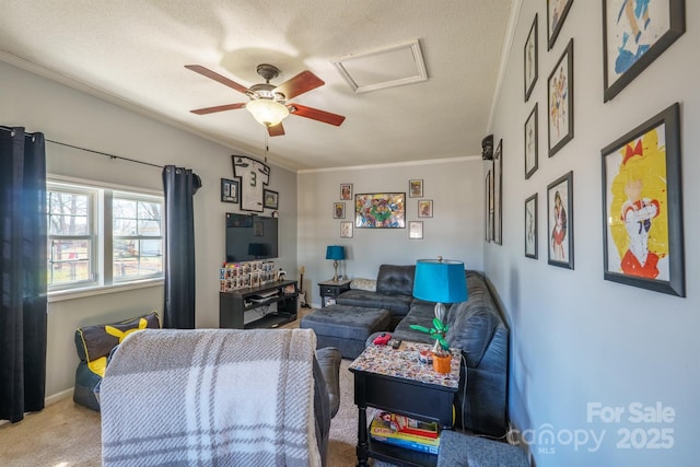 carpeted living room with crown molding, ceiling fan, and a textured ceiling