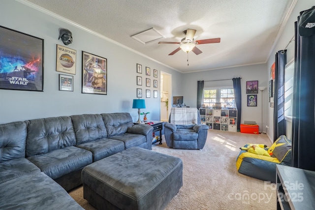 carpeted living room with crown molding, ceiling fan, and a textured ceiling