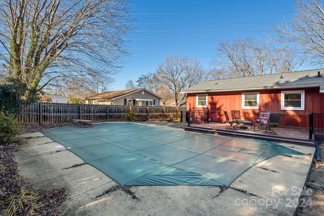 view of pool featuring a patio