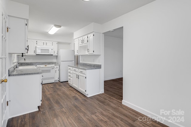 kitchen featuring sink, white cabinets, dark hardwood / wood-style floors, and white appliances