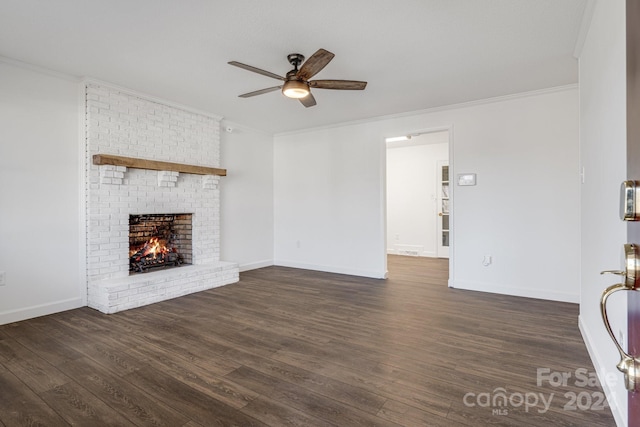 unfurnished living room featuring a fireplace, ceiling fan, dark hardwood / wood-style flooring, and ornamental molding