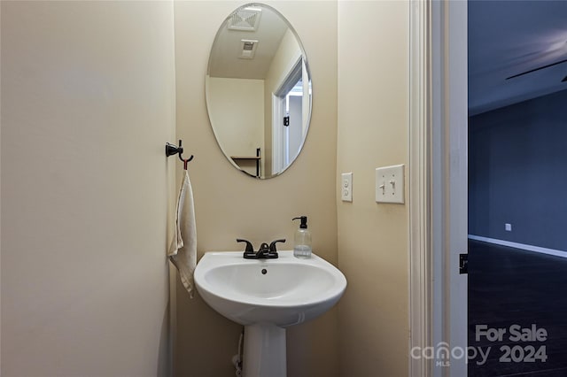 bathroom featuring hardwood / wood-style floors