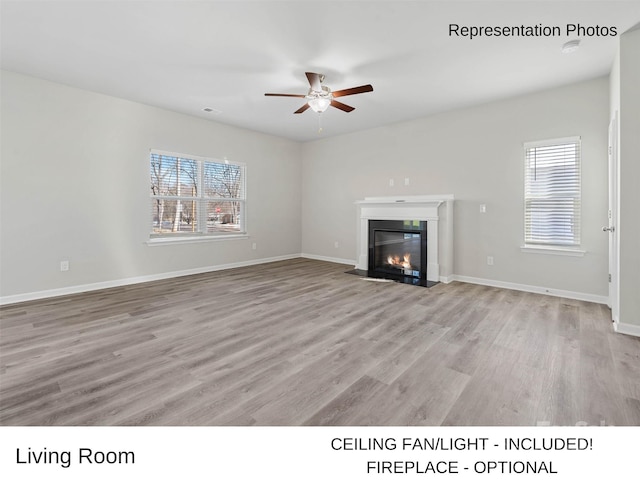 unfurnished living room with ceiling fan and light wood-type flooring