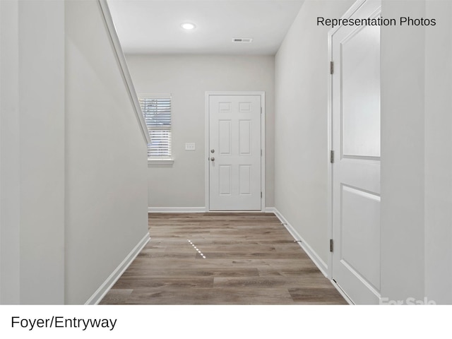 hallway featuring light wood-type flooring