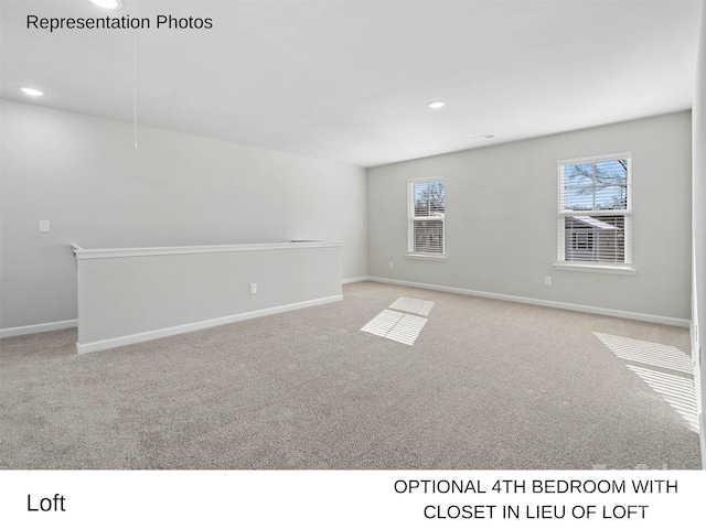 view of carpeted spare room